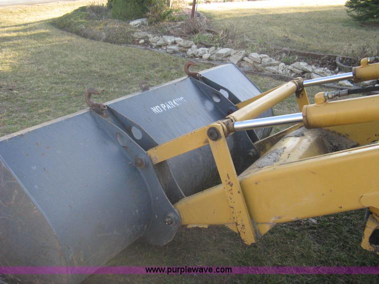 image for item A4383 1999 New Holland LB75 backhoe