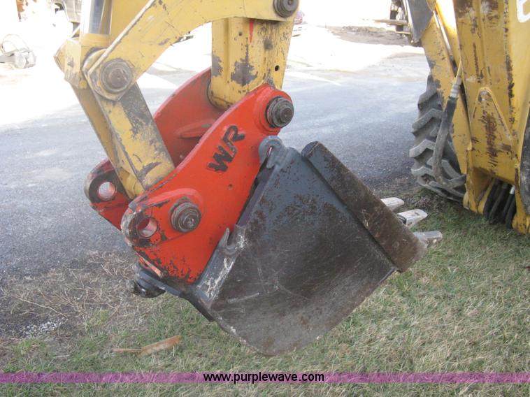 image for item A4383 1999 New Holland LB75 backhoe