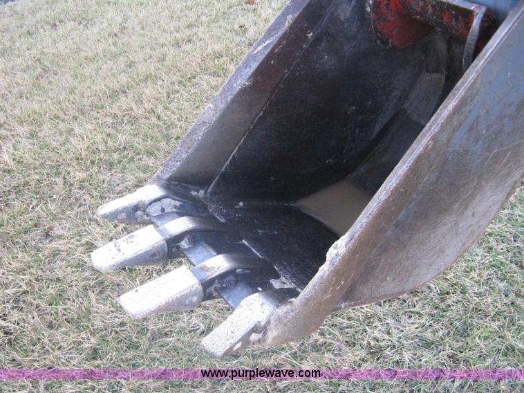 image for item A4383 1999 New Holland LB75 backhoe