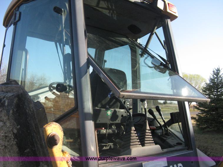 image for item A4383 1999 New Holland LB75 backhoe