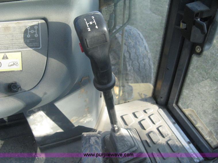 image for item A4383 1999 New Holland LB75 backhoe