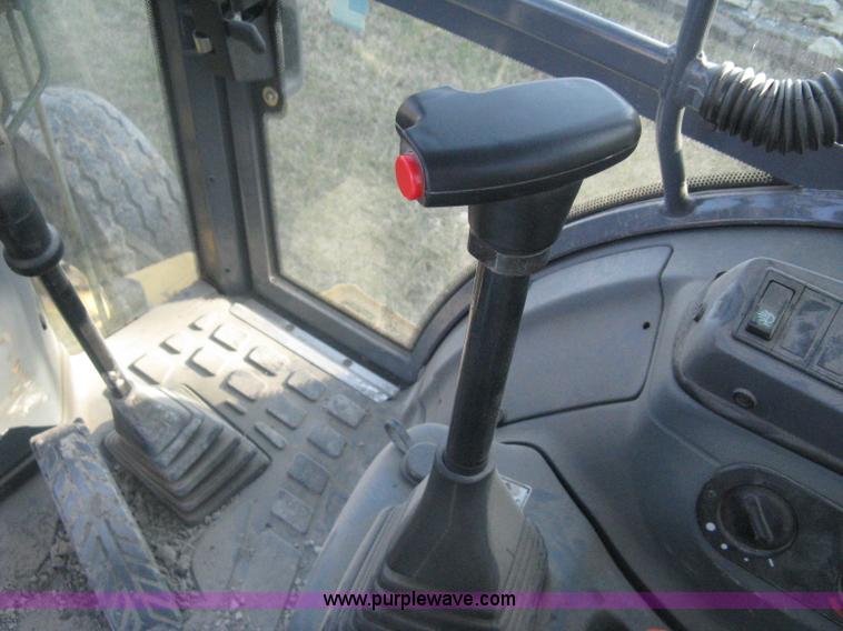 image for item A4383 1999 New Holland LB75 backhoe