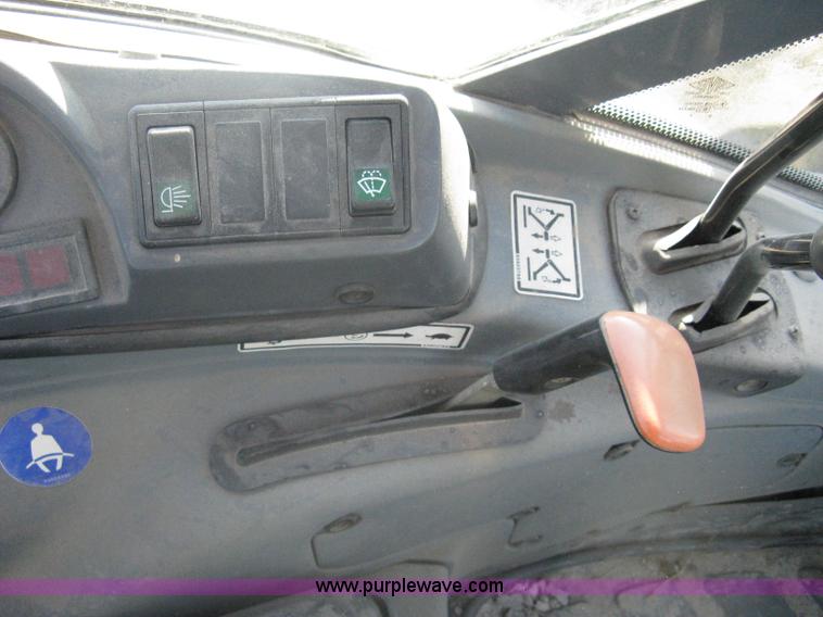 image for item A4383 1999 New Holland LB75 backhoe