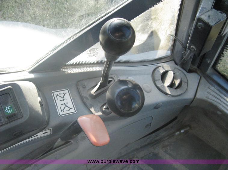 image for item A4383 1999 New Holland LB75 backhoe