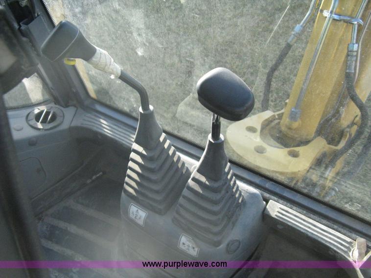 image for item A4383 1999 New Holland LB75 backhoe