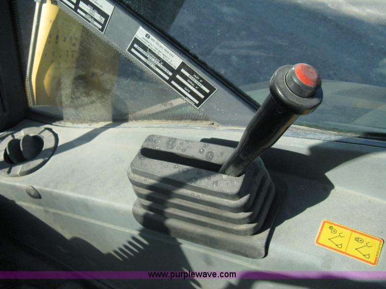 image for item A4383 1999 New Holland LB75 backhoe