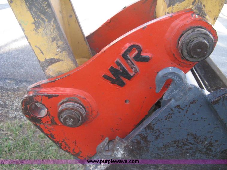 image for item A4383 1999 New Holland LB75 backhoe