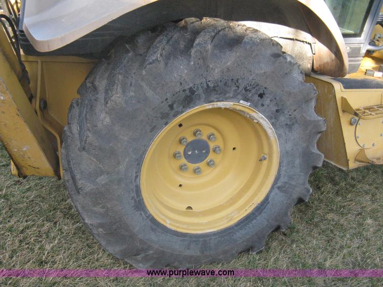 image for item A4383 1999 New Holland LB75 backhoe