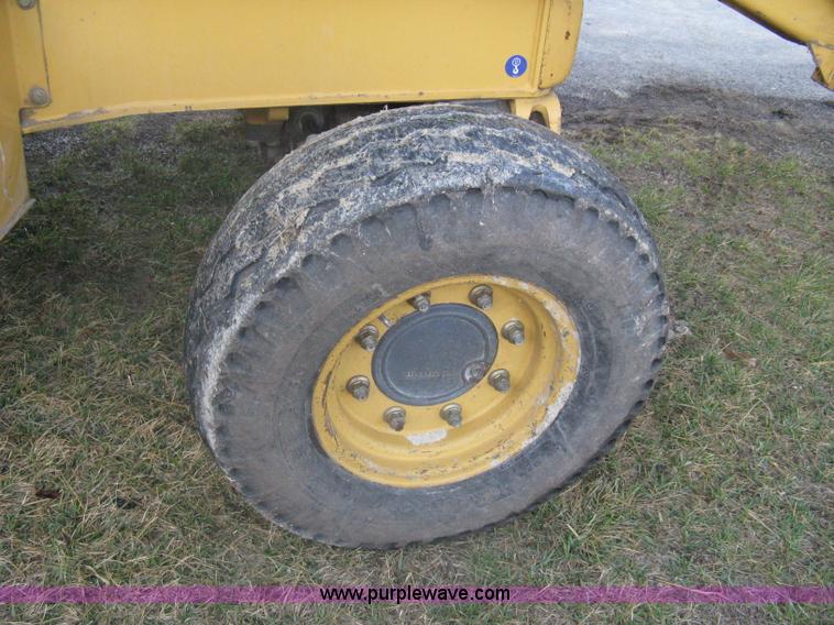 image for item A4383 1999 New Holland LB75 backhoe