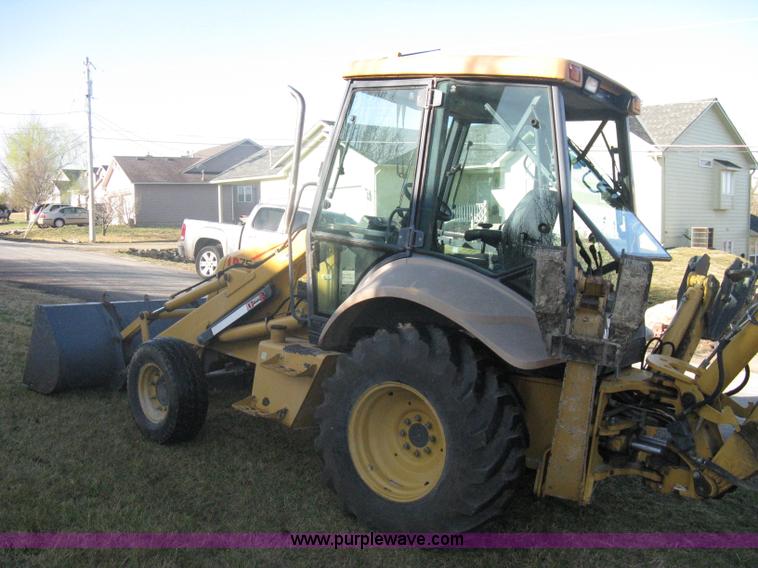 image for item A4383 1999 New Holland LB75 backhoe