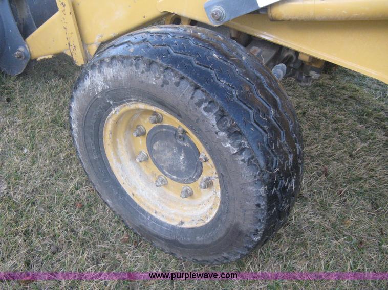 image for item A4383 1999 New Holland LB75 backhoe