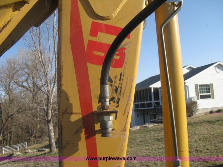 image for item A4383 1999 New Holland LB75 backhoe