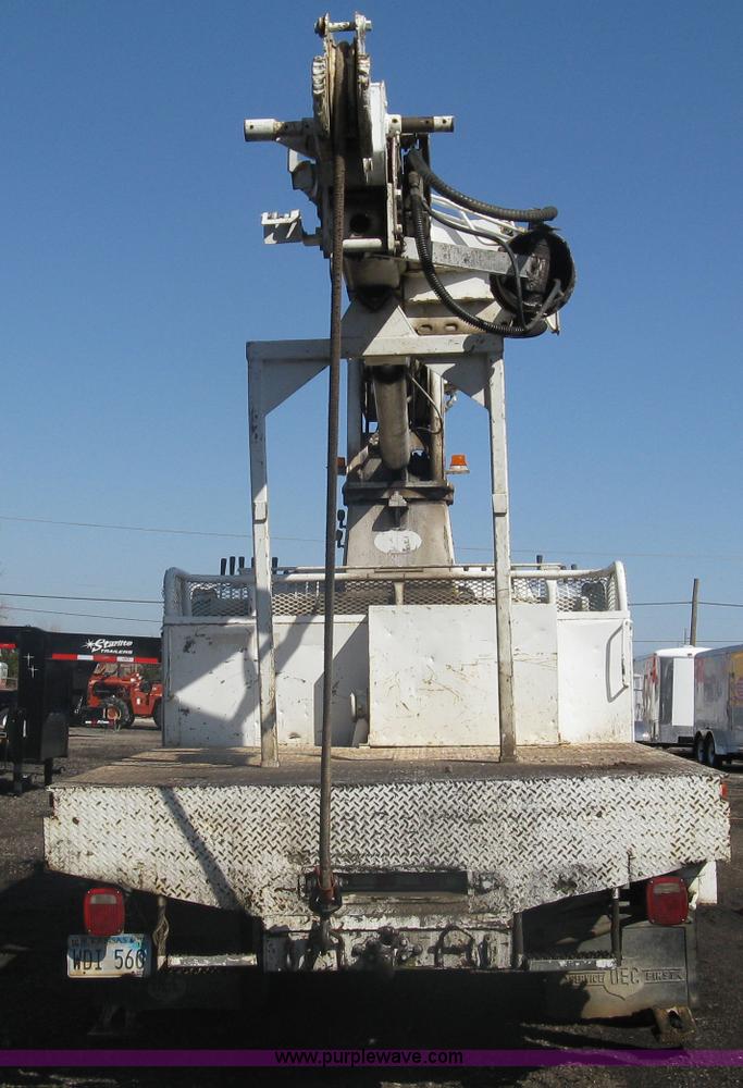 image for item A6113 1985 Chevrolet Kodiak C70 boom/digger derrick truck
