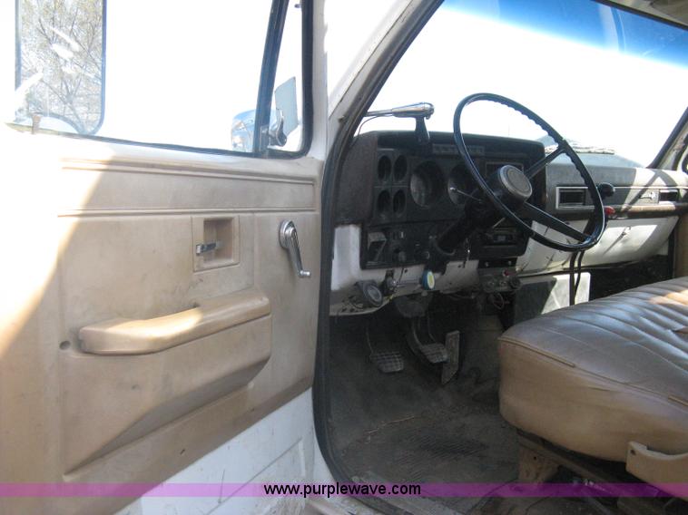 image for item A6113 1985 Chevrolet Kodiak C70 boom/digger derrick truck