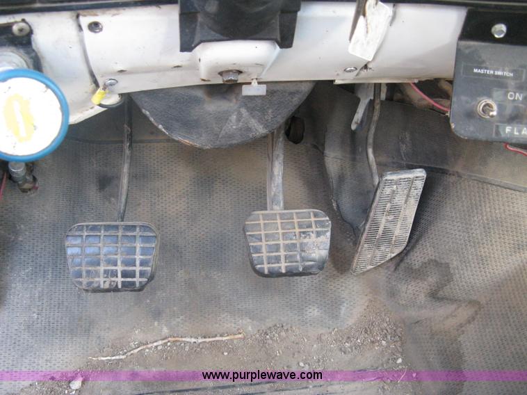 image for item A6113 1985 Chevrolet Kodiak C70 boom/digger derrick truck