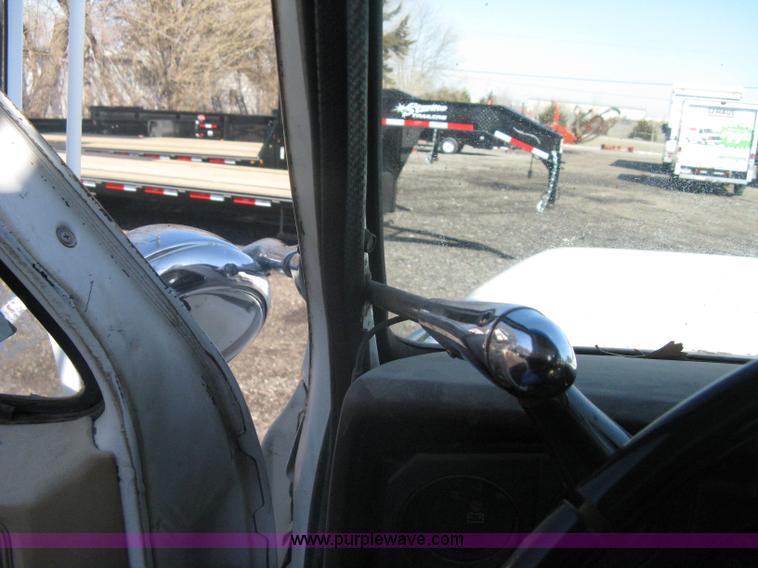 image for item A6113 1985 Chevrolet Kodiak C70 boom/digger derrick truck