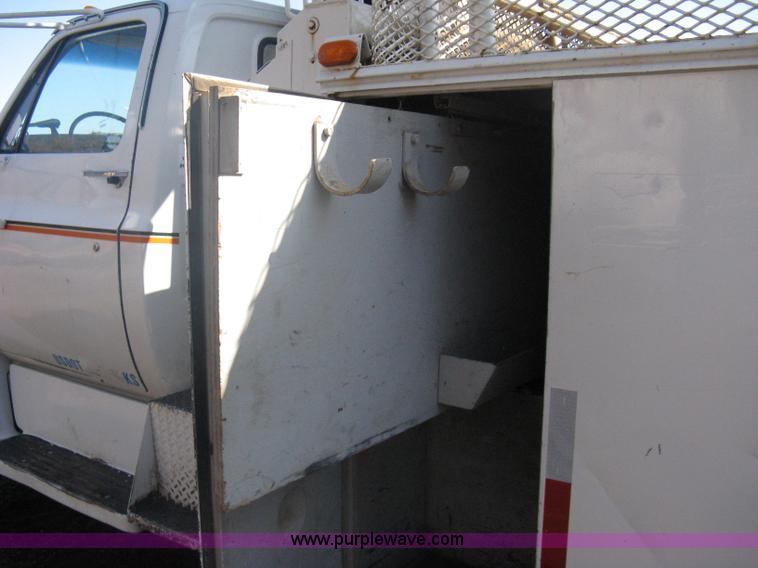 image for item A6113 1985 Chevrolet Kodiak C70 boom/digger derrick truck