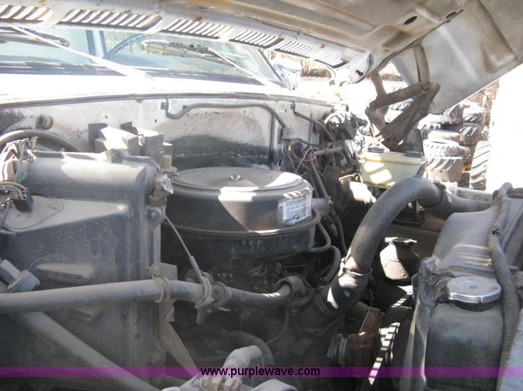 image for item A6113 1985 Chevrolet Kodiak C70 boom/digger derrick truck