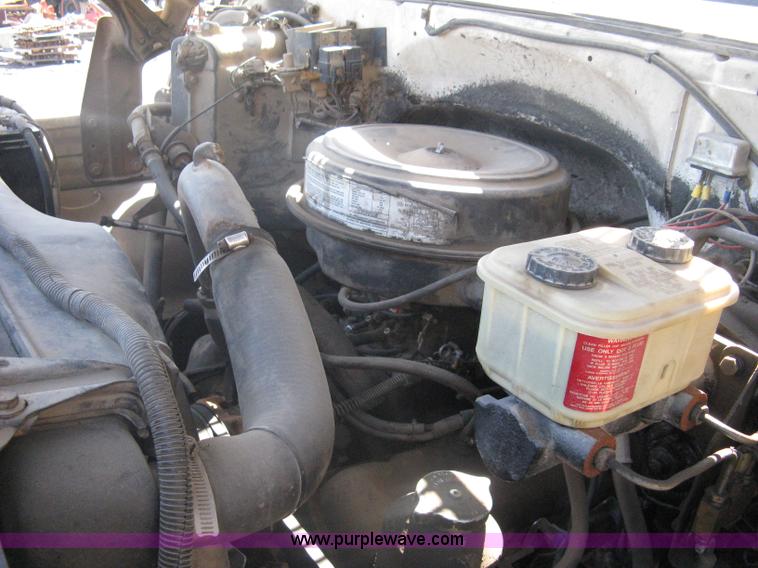 image for item A6113 1985 Chevrolet Kodiak C70 boom/digger derrick truck