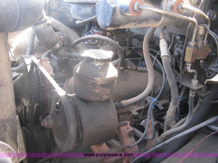 image for item A6113 1985 Chevrolet Kodiak C70 boom/digger derrick truck