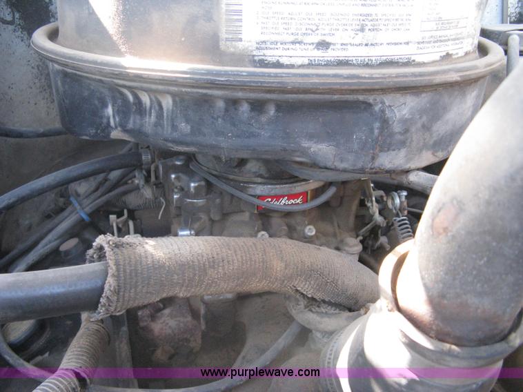 image for item A6113 1985 Chevrolet Kodiak C70 boom/digger derrick truck