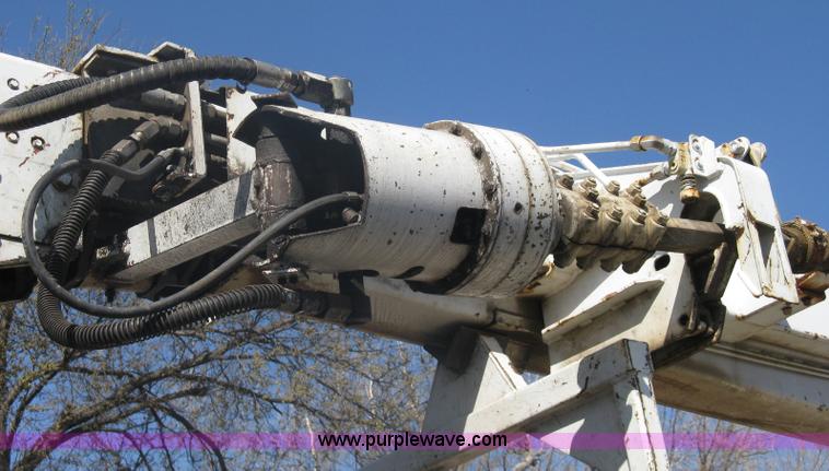image for item A6113 1985 Chevrolet Kodiak C70 boom/digger derrick truck