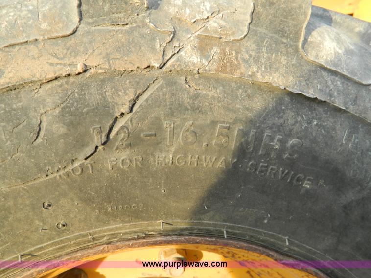 image for item B3584 1999 John Deere 310E FWA backhoe