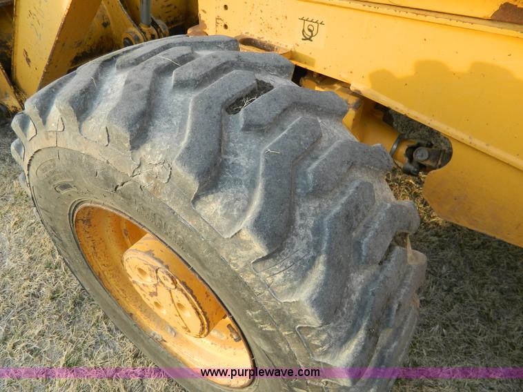 image for item B3584 1999 John Deere 310E FWA backhoe