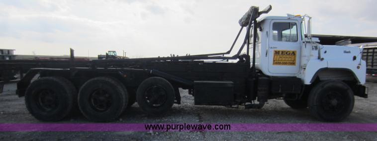 image for item C5366 1988 Mack DM686S roll off truck