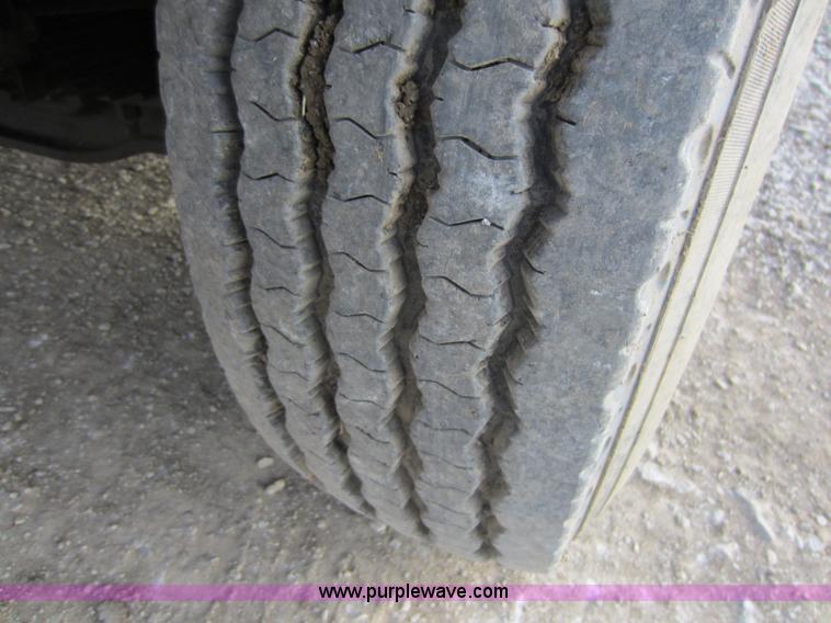 image for item C5366 1988 Mack DM686S roll off truck