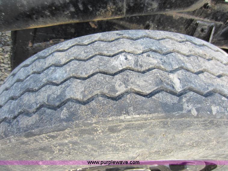 image for item C5366 1988 Mack DM686S roll off truck