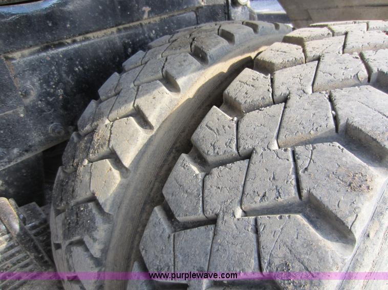 image for item C5366 1988 Mack DM686S roll off truck