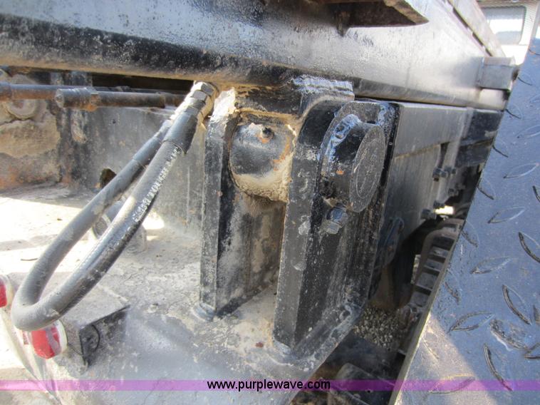 image for item C5366 1988 Mack DM686S roll off truck