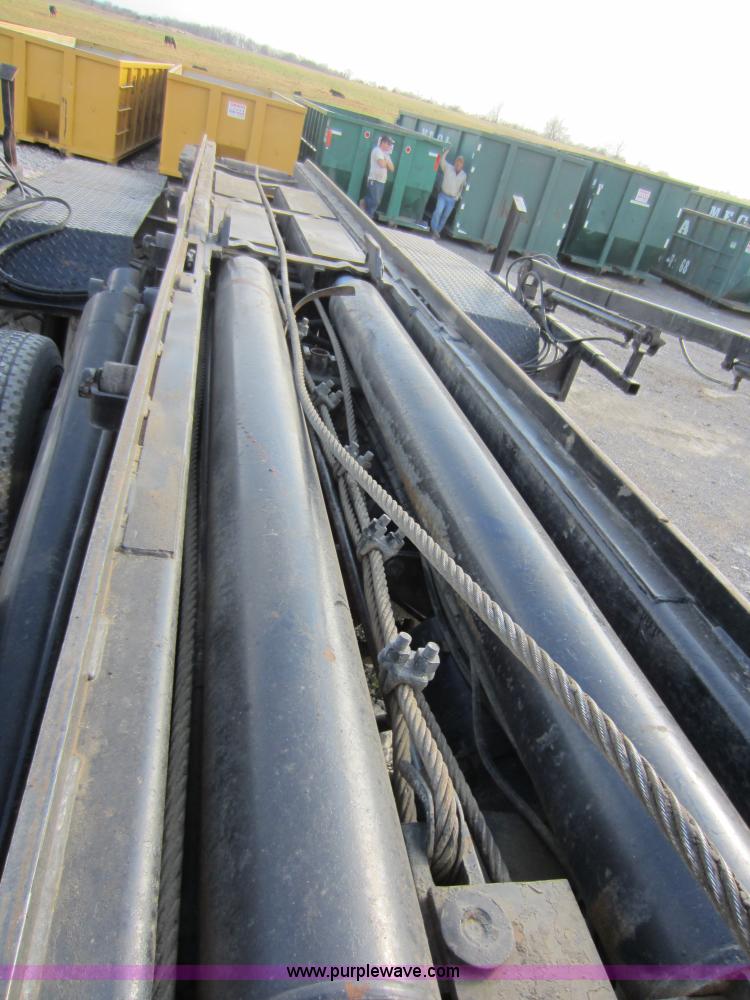 image for item C5366 1988 Mack DM686S roll off truck