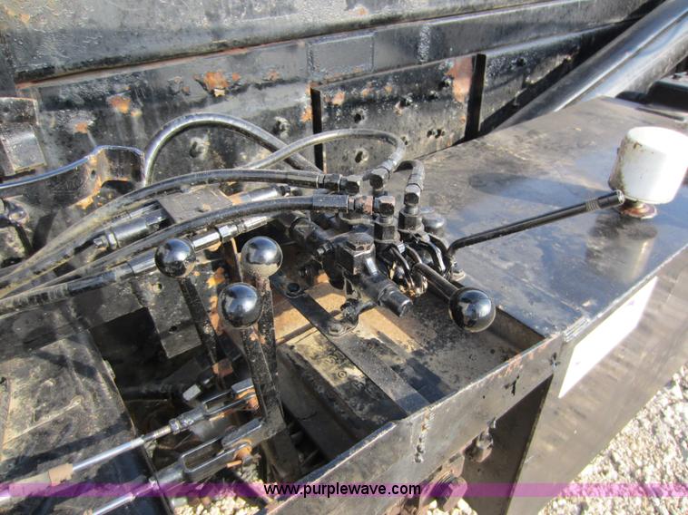 image for item C5366 1988 Mack DM686S roll off truck