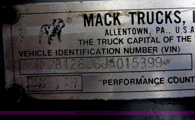 image for item C5366 1988 Mack DM686S roll off truck