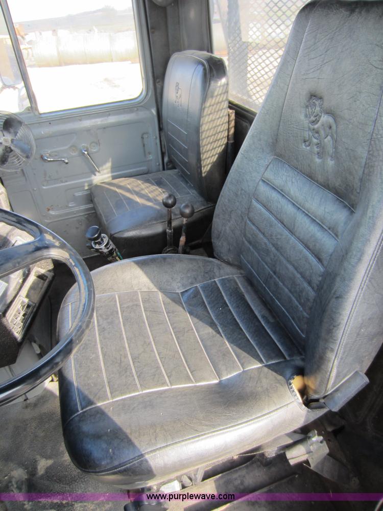 image for item C5366 1988 Mack DM686S roll off truck