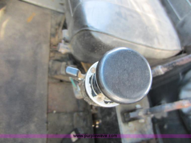 image for item C5366 1988 Mack DM686S roll off truck