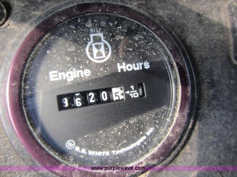 image for item C5366 1988 Mack DM686S roll off truck