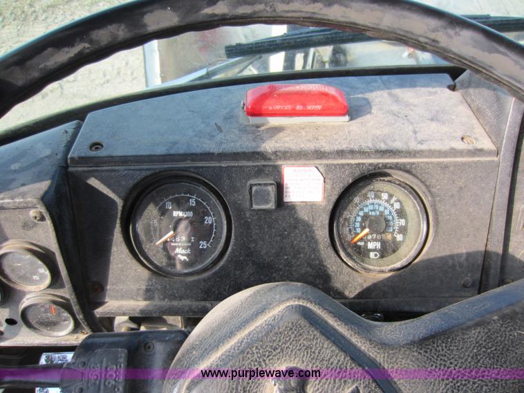 image for item C5366 1988 Mack DM686S roll off truck