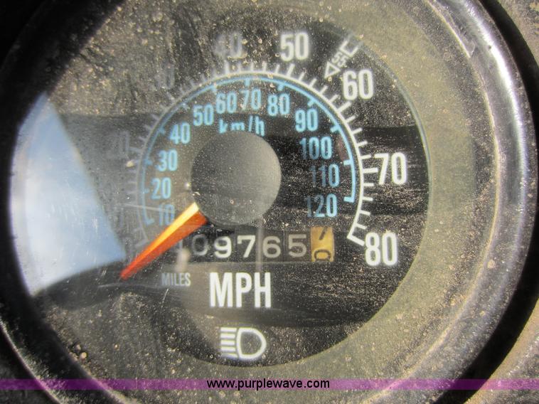 image for item C5366 1988 Mack DM686S roll off truck