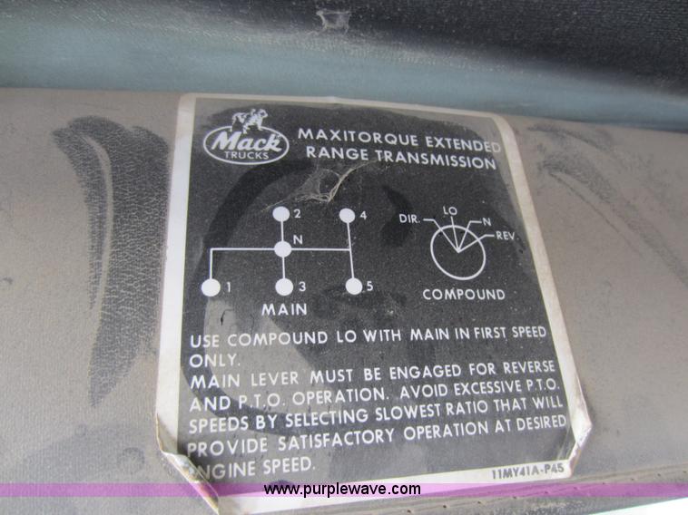 image for item C5366 1988 Mack DM686S roll off truck