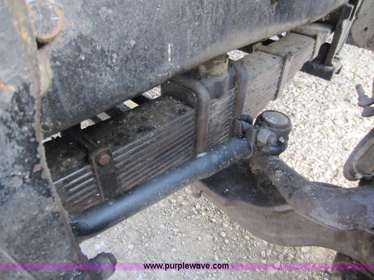 image for item C5366 1988 Mack DM686S roll off truck