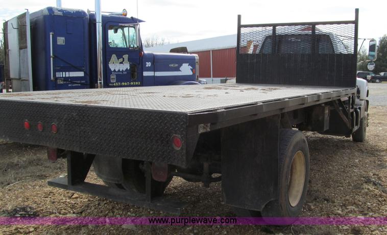 image for item D3071 1999 GMC C7500 dump truck
