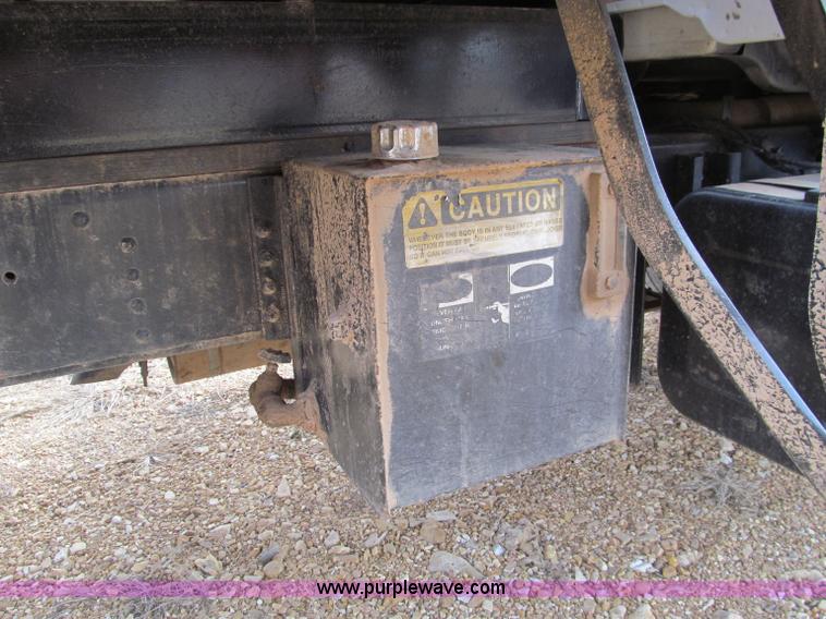 image for item D3071 1999 GMC C7500 dump truck