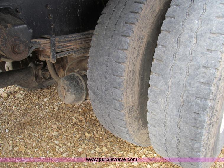 image for item D3071 1999 GMC C7500 dump truck