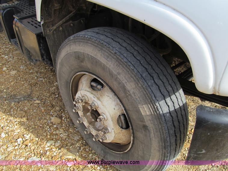 image for item D3071 1999 GMC C7500 dump truck