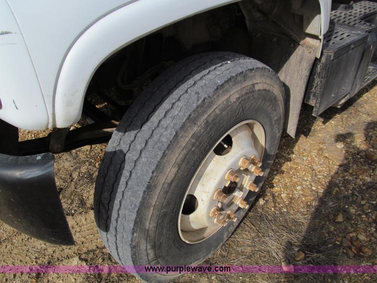 image for item D3071 1999 GMC C7500 dump truck