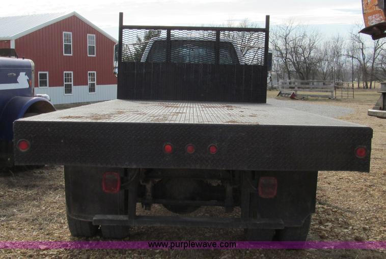 image for item D3071 1999 GMC C7500 dump truck