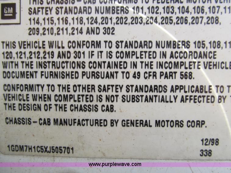 image for item D3071 1999 GMC C7500 dump truck